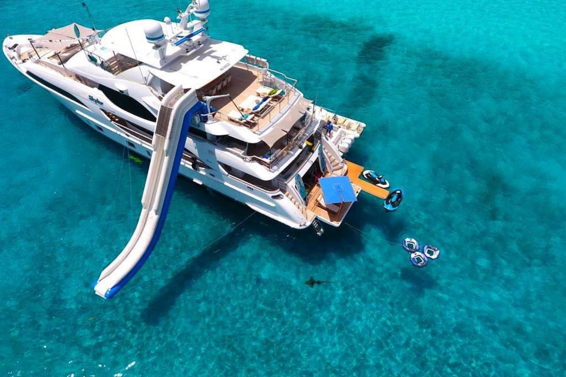 Mega yacht with inflatable slide